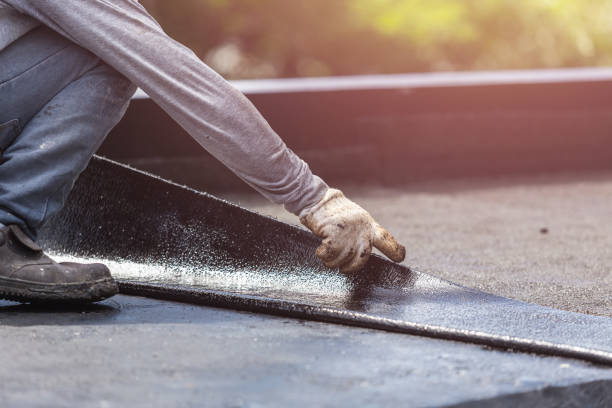 Professional Basement Waterproofing technician working in Duncan Falls, OH
